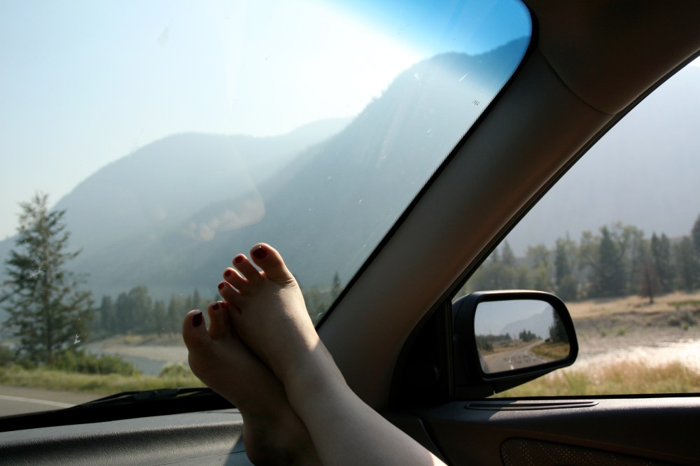 feet on a dashboard